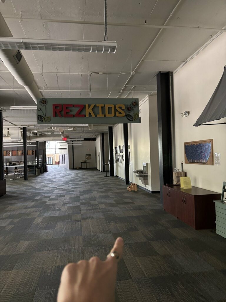 The RezKids sign above the check-in area